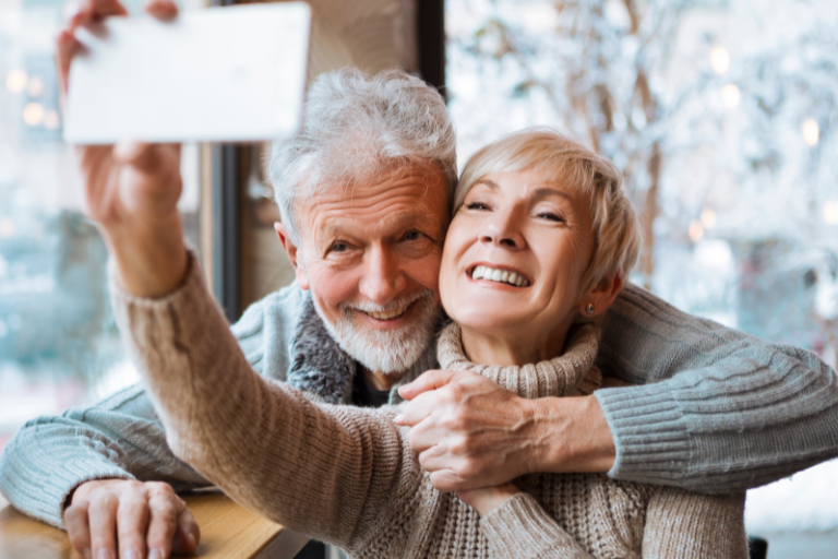 man and woman smiling after dental implant treatment at viva dental